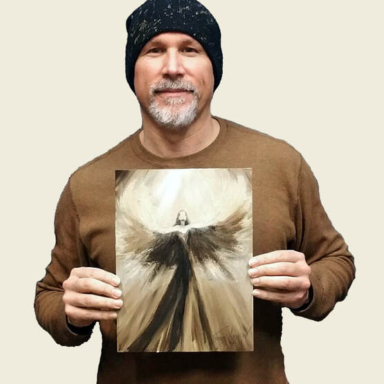 Tom holding Angel of Praise — a 9×12 inch original painting